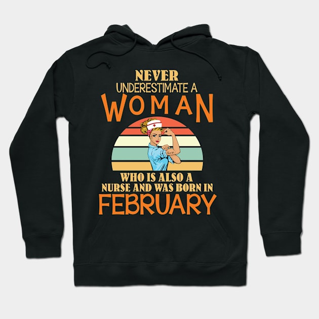 Never Underestimate A Woman Is A Nurse Was Born In February Hoodie by joandraelliot